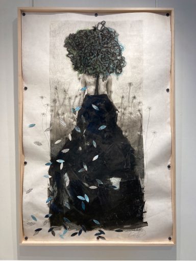 Encadrement des techniques mixtes sur papier japonais portrayant un homme abstrait. « L'homme qui fait vibrer mon coeur » par Joann Côté à vendre à la Galerie Blanche de Montréal.